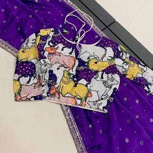 The beautiful purple color Saree